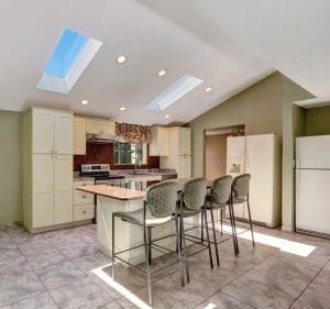 Bright sunny kitchen with vaulted ceiling and skylights, 17 Trends for Sustainable Homes in 2017 on elemental green