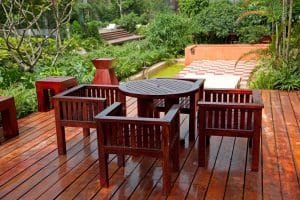 House patio with table and chairs, Sustainable Advantages and Inspirations of Redwood on elemental green