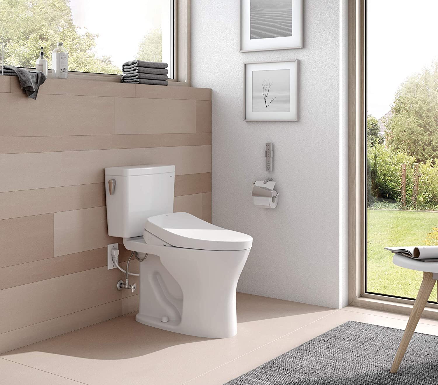 Toto Drake Washlet Low-Flow Toilet in a bathroom