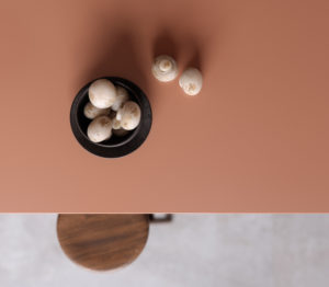 Overhead view of a salmon colored countertop by Silestone