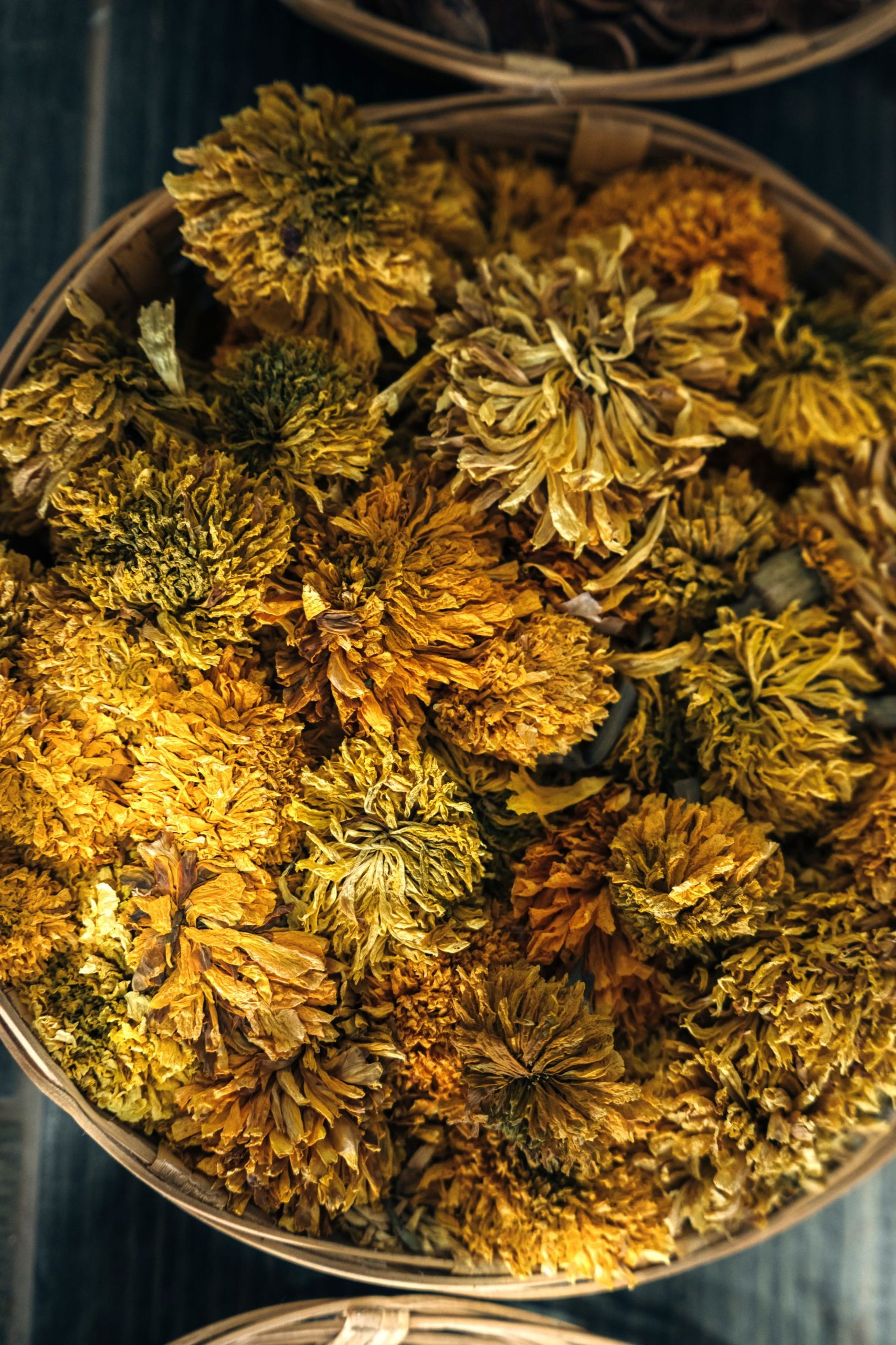 Looking down into basket of dried flowers
