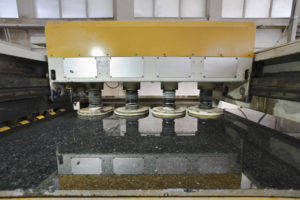 Italy, marble cutting factory, sliced marble polishing - industrial