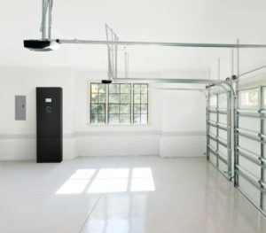 white residential garage interior with black solar battery