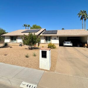 Energy saving Pearl Certified suburban home with solar panels in dry climate - photo